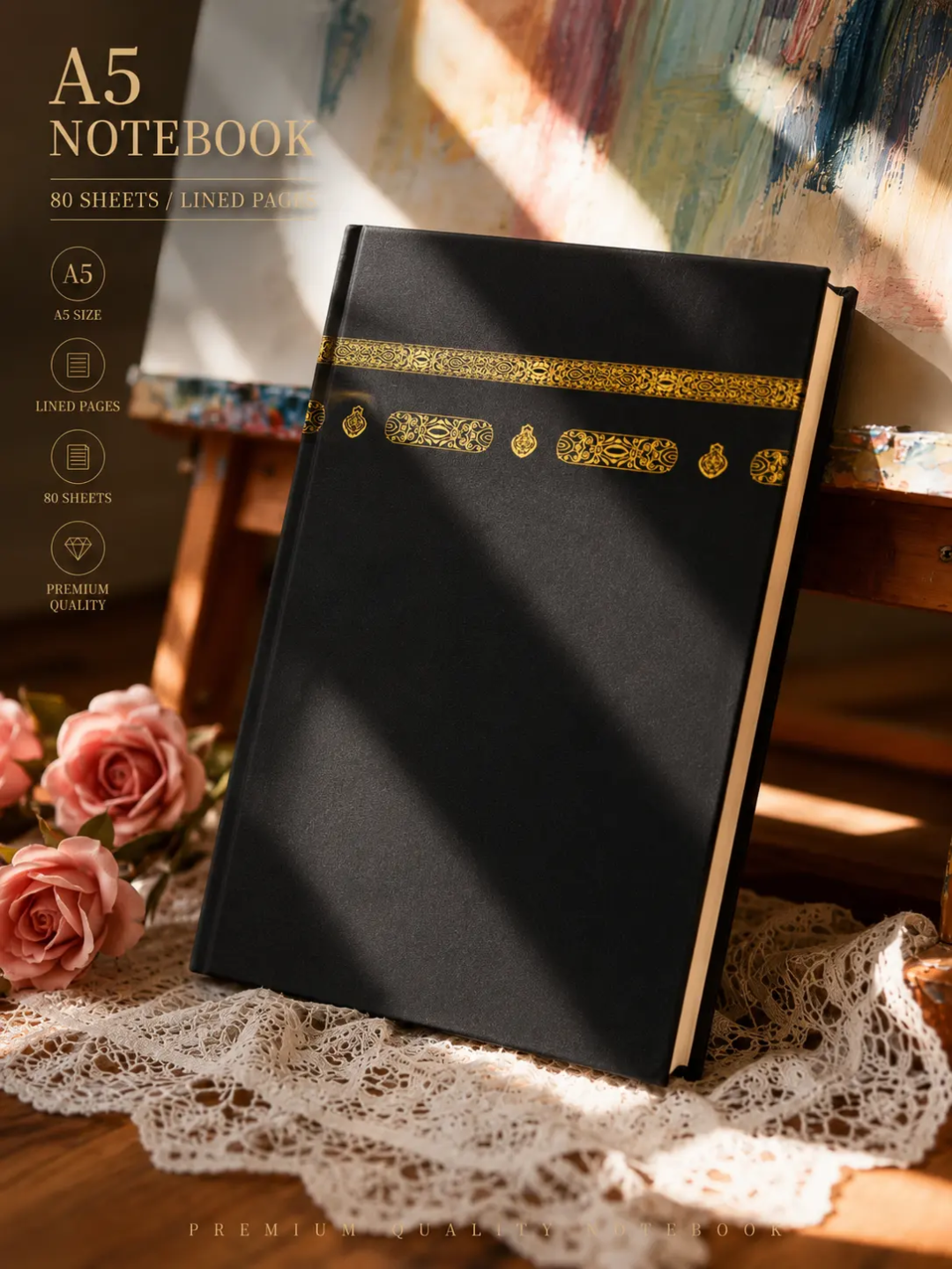 Black and gold Kaaba inspired A5 hardcover notebook featuring decorative Kiswah style pattern and black ribbon bookmark on luxury desk.
