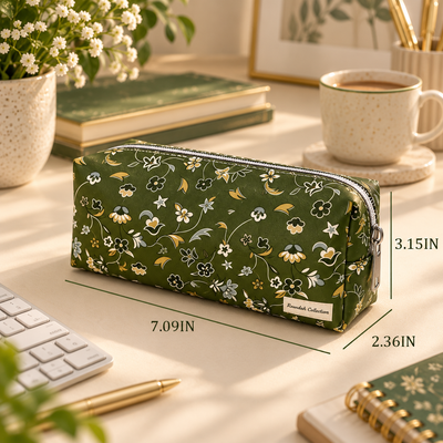 Rawdah floral pencil case displayed on elegant cream desk with notebook, coffee and stationery, olive green Islamic stationery pouch inspired by Madinah.